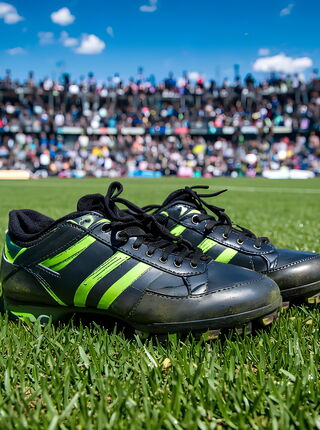 Fußballschuhe auf dem Rasen